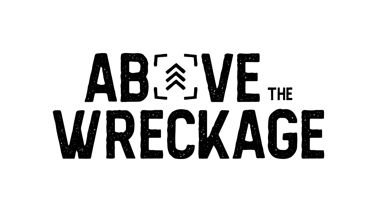 Above the Wreckage Logo, writing 'Above the Wreckage in a bold, rough font.'